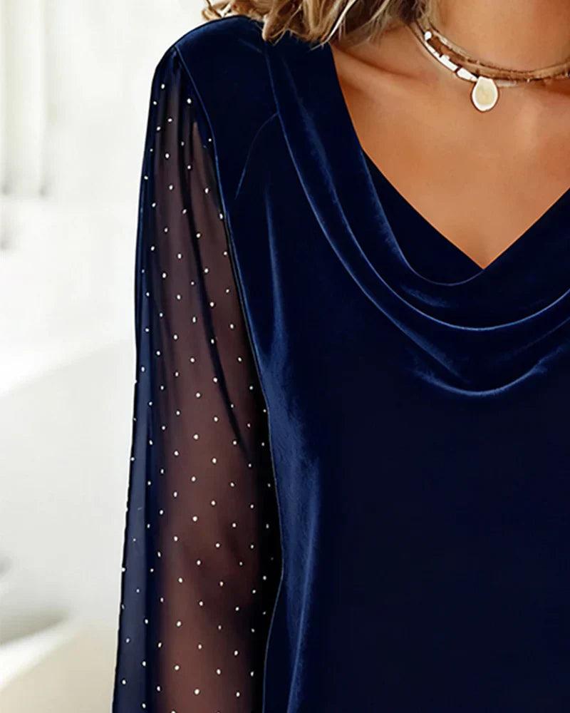 Blouse with pearls and semi-transparent panels