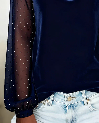 Blouse with pearls and semi-transparent panels