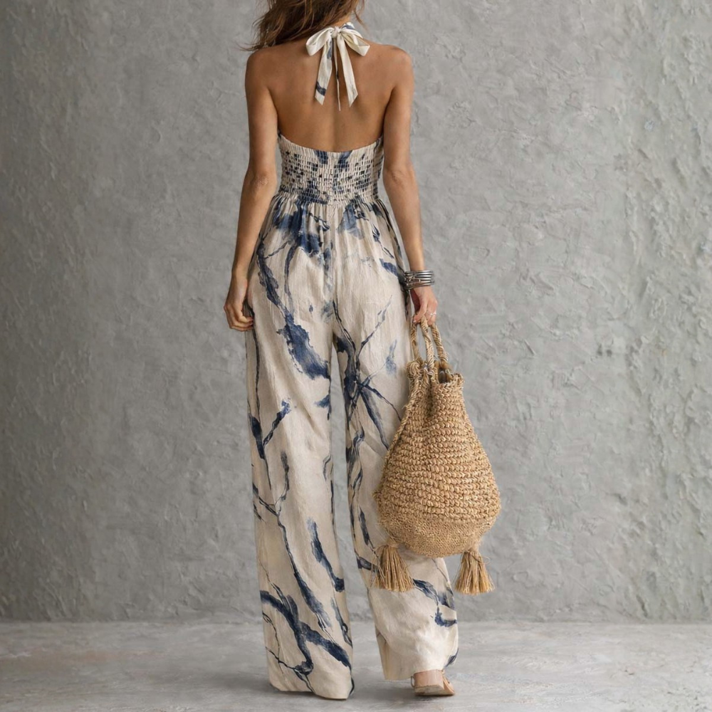 VIOLETA – Mono Elegante Con Estampado Artístico
