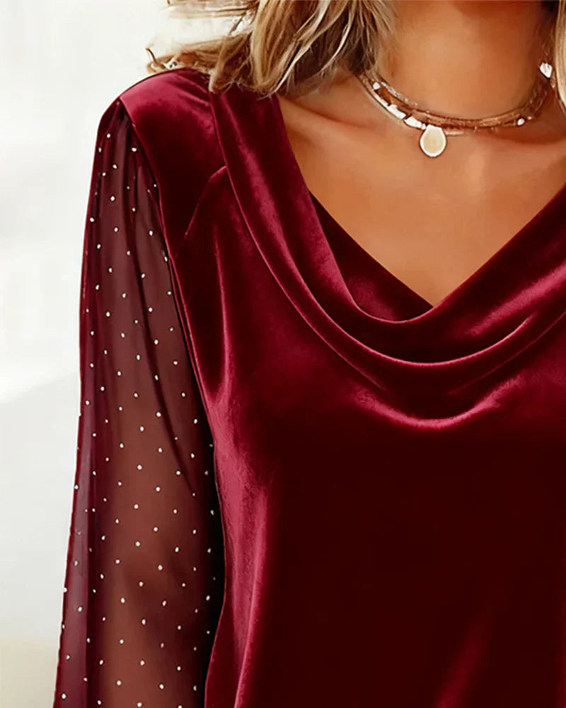 Blouse with pearls and semi-transparent panels