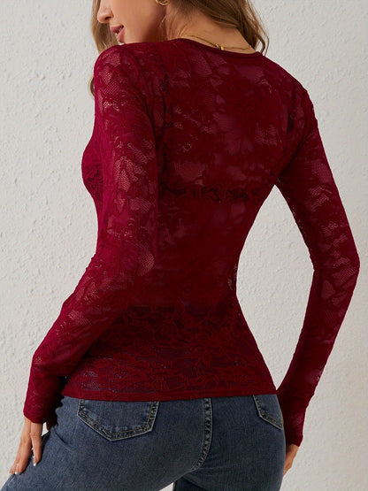 Top de manga larga con encaje floral