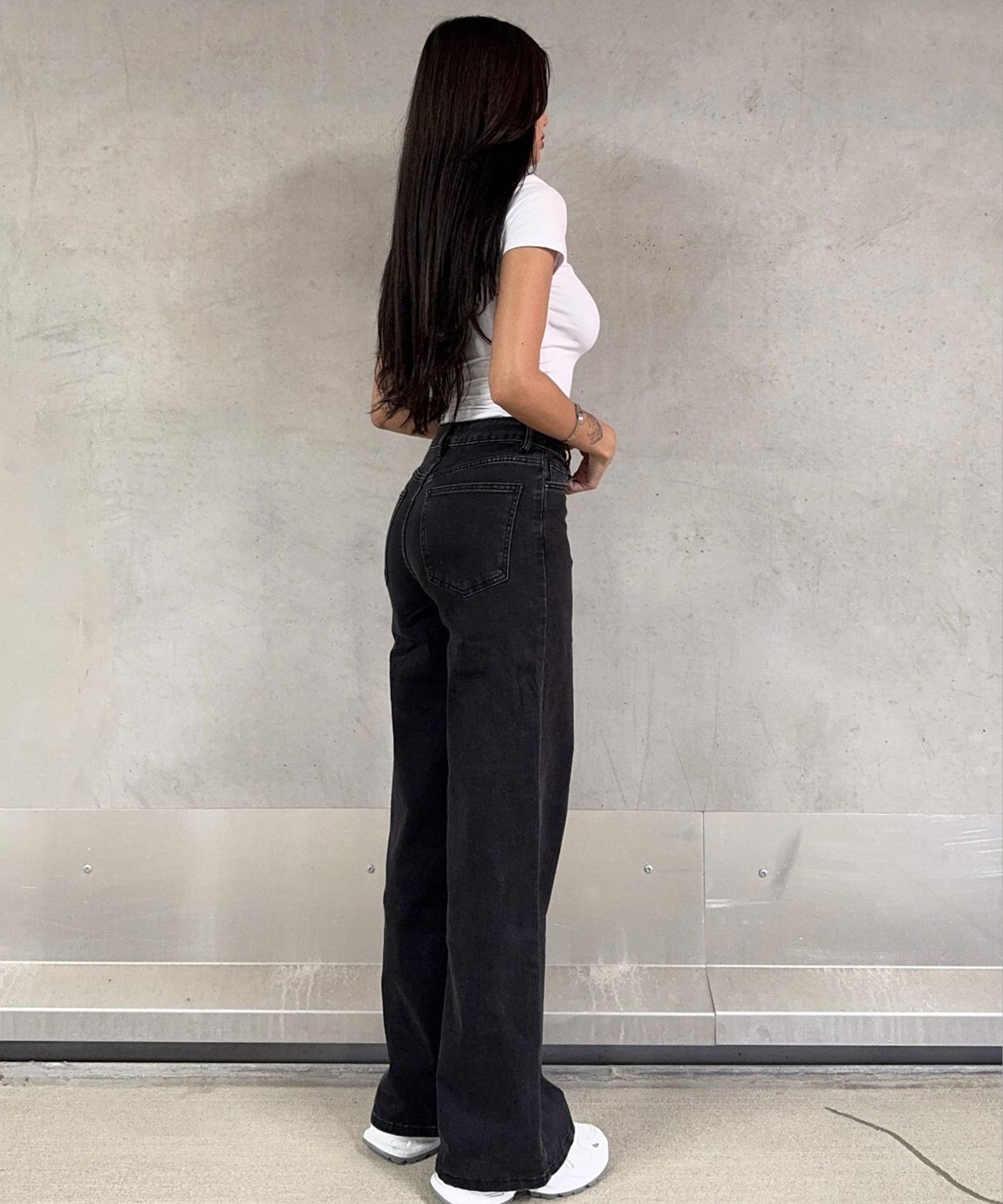 Vaqueros elásticos de pierna ancha negros