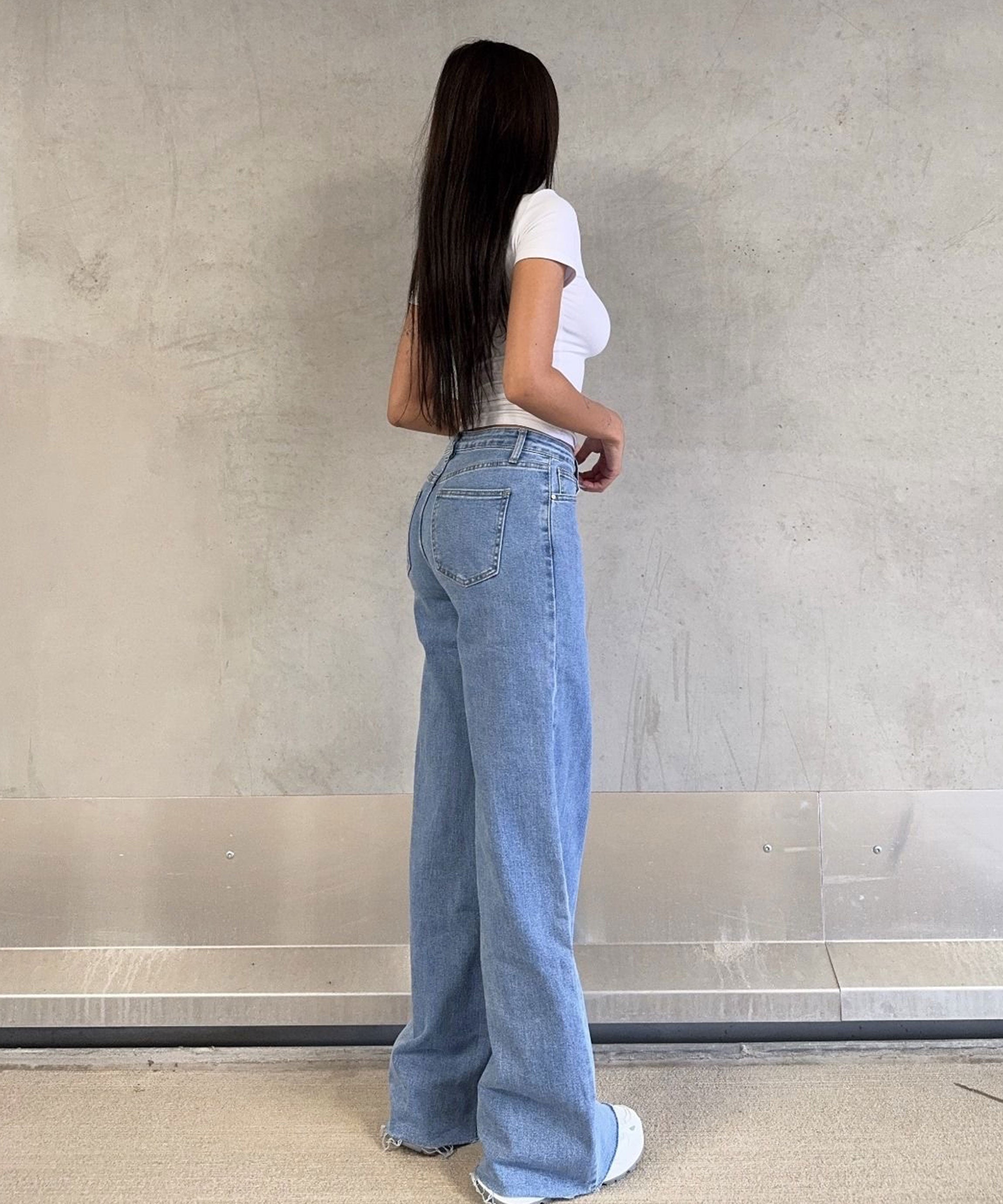 Vaqueros elásticos de cintura media y pierna ancha