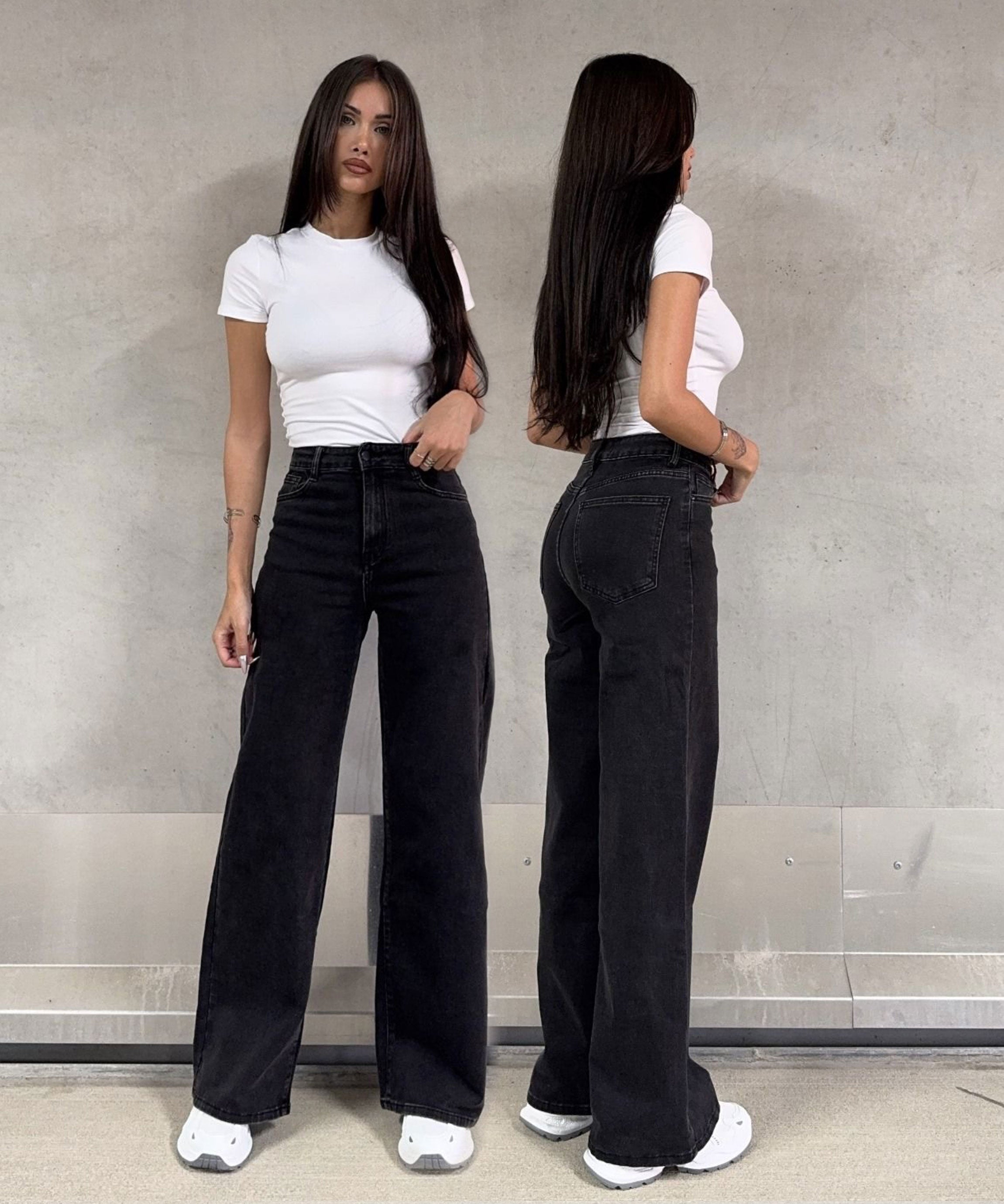 Vaqueros elásticos de pierna ancha negros