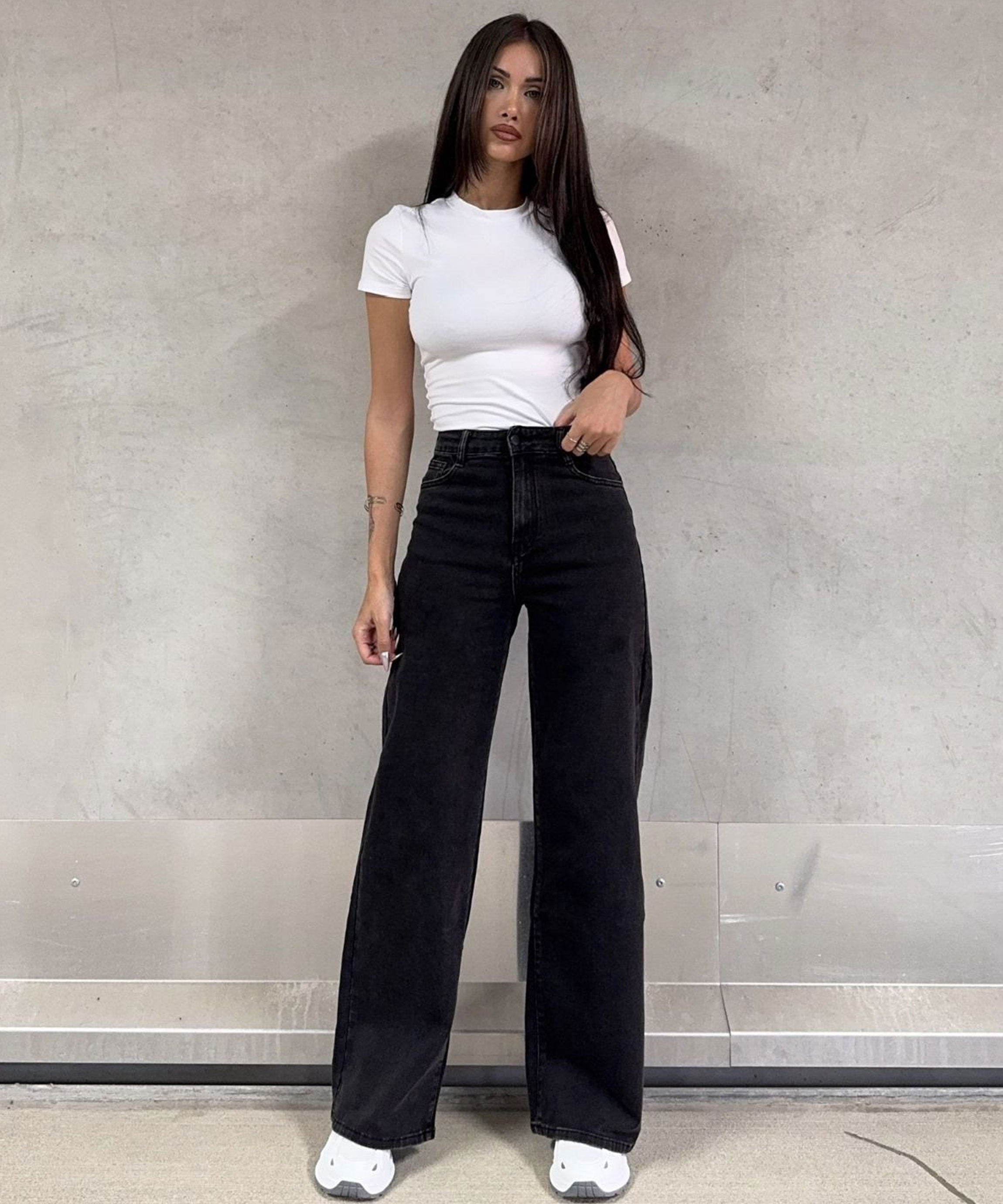 Vaqueros elásticos de pierna ancha negros